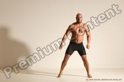 Underwear Gymnastic poses Man Black Muscular Bald Dancing Dynamic poses Academic